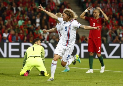 Islanda smulge un punct Portugaliei. Prima surpriza la EURO 2016