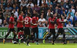 Manchester United o spulbera pe Swansea si e liderul momentului in Premier League